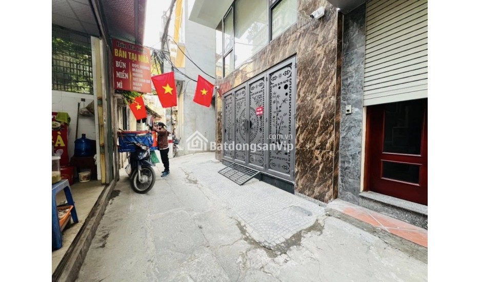Bán nhà Tân Mai – 50m² x 7T thang máy, ô tô đỗ cửa – 13.5 tỷ